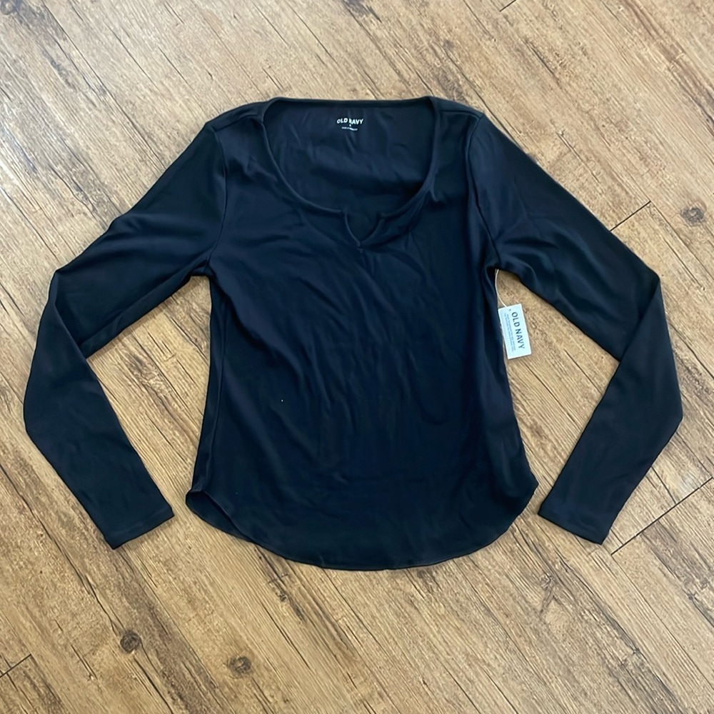 Black long sleeve top.